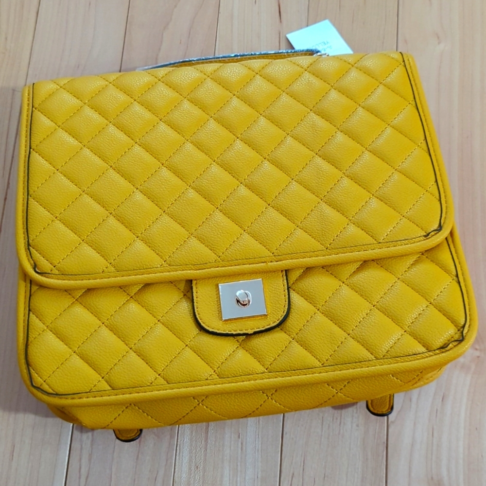Vegan leather yellow backpack convertible to cross body